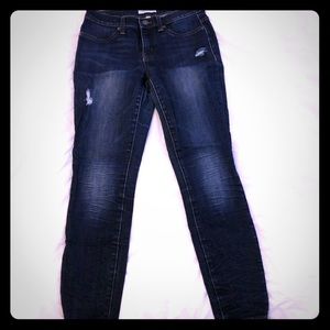 Distressed ankle jeans